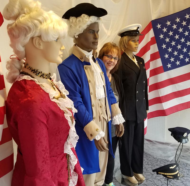 kostume room owner gayle vaartjes with patriotic costume display